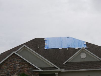 Protect Your Roof from the Elements with Roof Tarping Services!